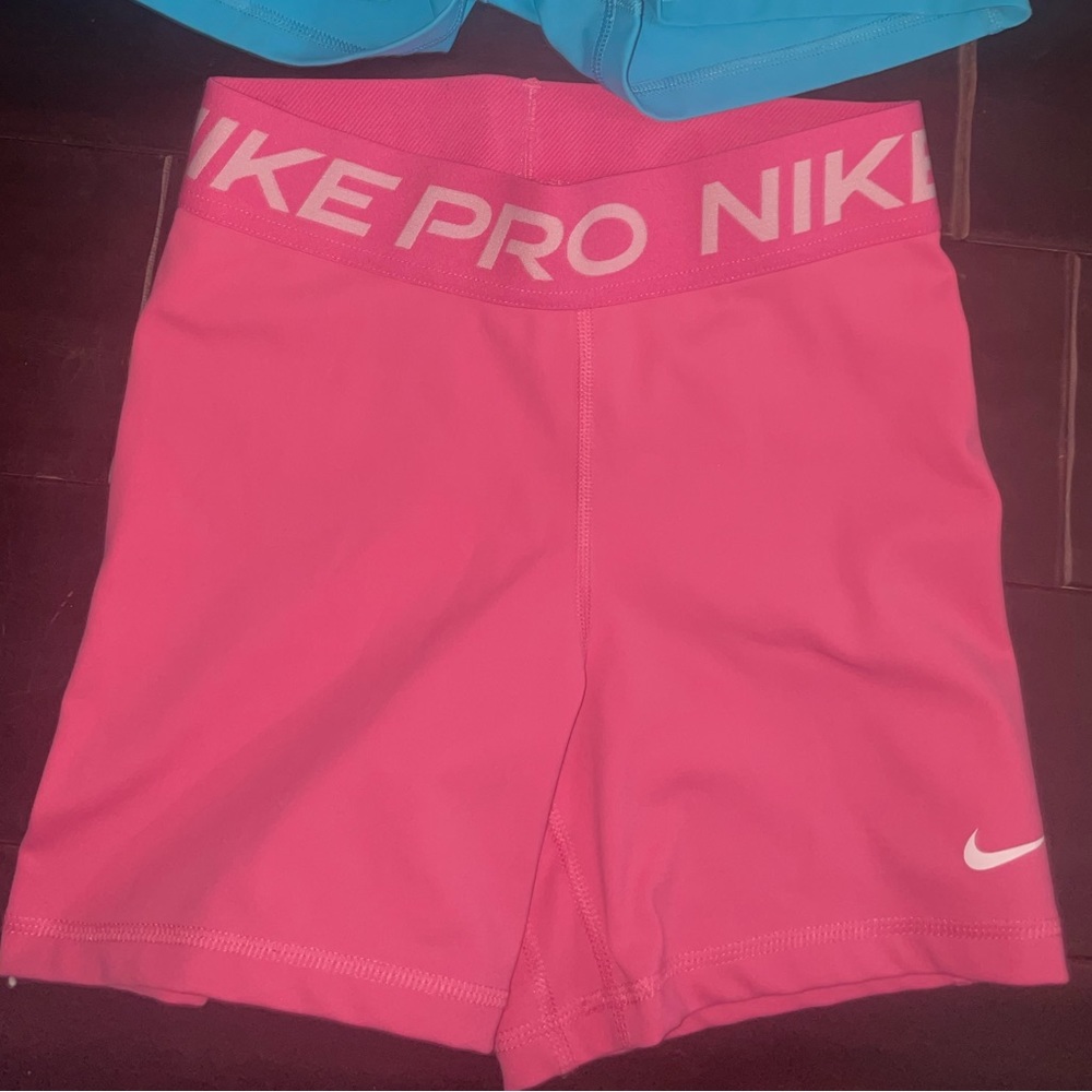 bubble gum pink nike pro shorts